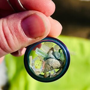 Rainbow locket with real shark tooth and gemstones.